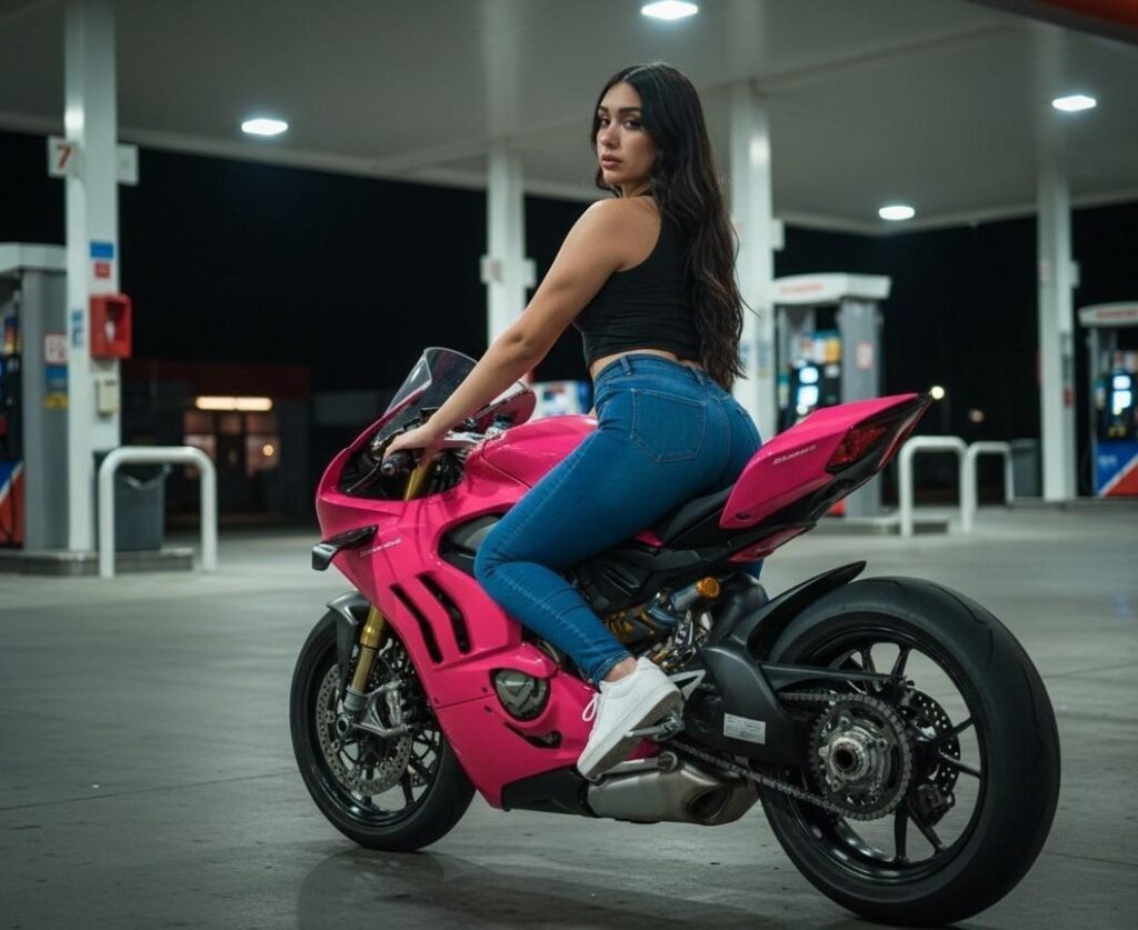 EmmaRubis riding a pink bike